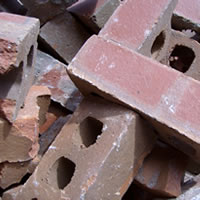 A close up image of a pile of bricks