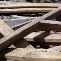 Close up image of wooden boards at a construction site.